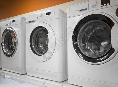 照片  |电器店出售现代洗衣机的礼物请看infofin照片  |家用电器店的